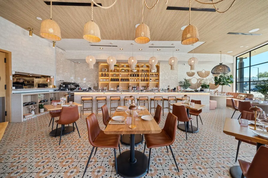 Main dining room and open kitchen at POPULAR restaurant in Encino, California